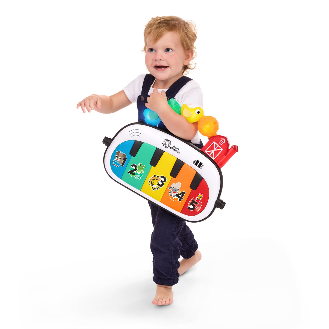 GIMNASIO DE ACTIVIDADES 4-IN-1 “KICKIN’ TUNES™ MUSICAL MEADOW”