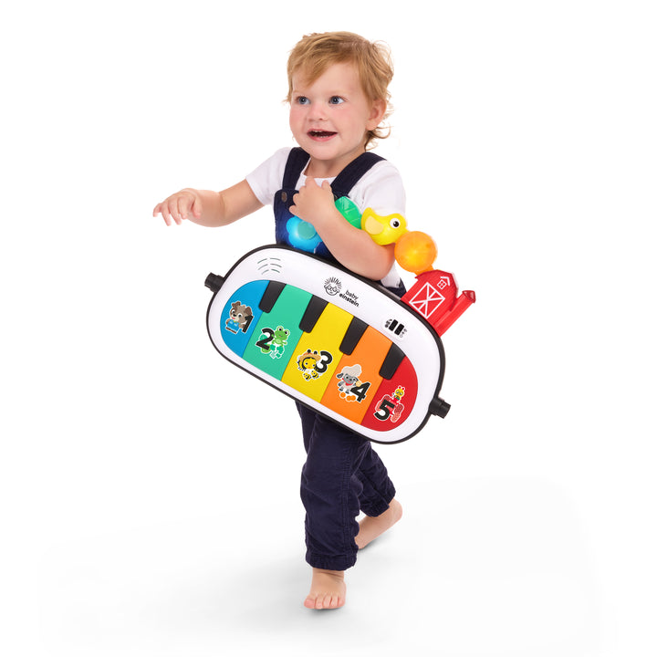 GIMNASIO DE ACTIVIDADES 4-IN-1 “KICKIN’ TUNES™ MUSICAL MEADOW”